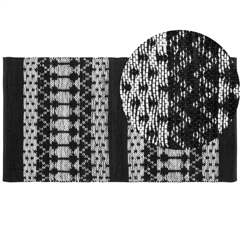 Aanbieding SOKUN - Laagpolig vloerkleed - Zwart - 80 x 150 cm - Leer